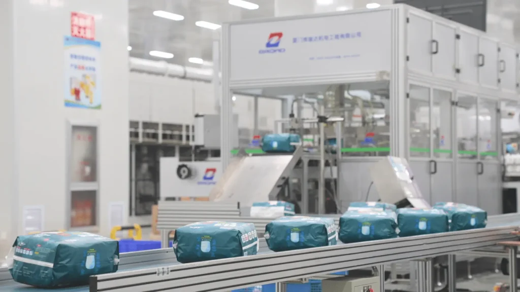 OEM diaper production line operating inside a cleanroom facility