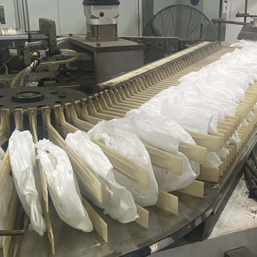 Shipping labels applied on export-ready diaper cartons
