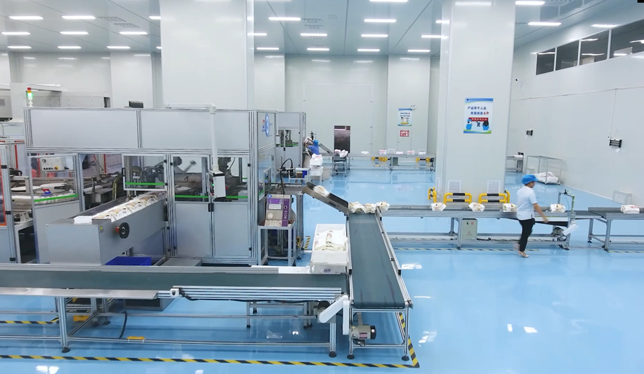 Diaper manufacturing workshop with in-house SAP core and nonwoven fabric production