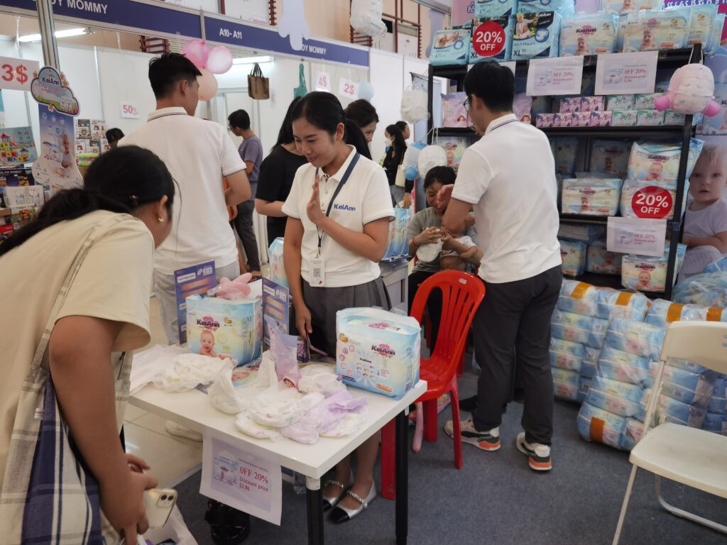 KeiAnn pull-ups and baby diapers displayed at Cambodia trade show booth