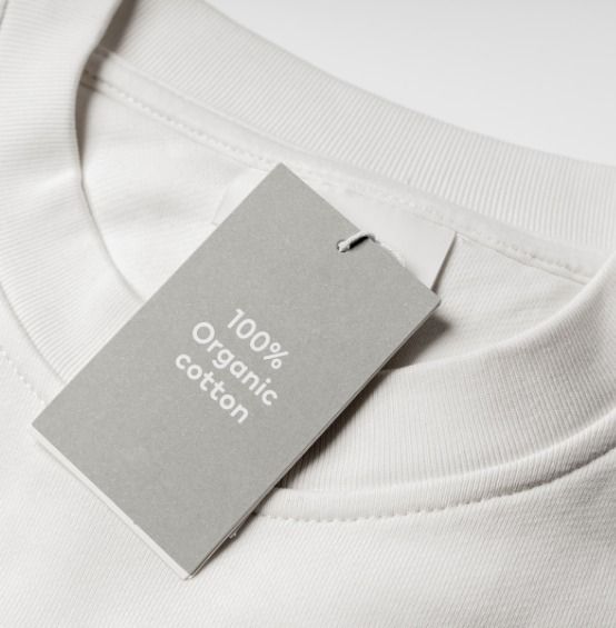"Close-up of natural cotton fabric showing soft, woven texture—representing pure 100% cotton material